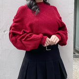 シャーリング袖カシュクールニット