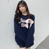 【予約商品 12月下旬発送】ラメリボンロゴジャガードニット