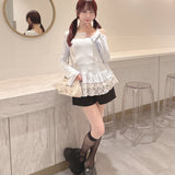 ペプラムティアードトップス