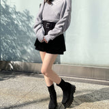 シャーリング袖カシュクールニット