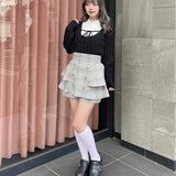 レイヤードケーブルニット