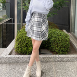 シャーリング袖カシュクールニット