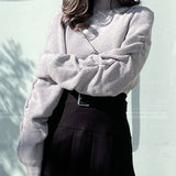 シャーリング袖カシュクールニット