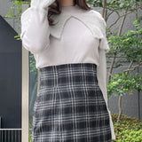 フェザー衿肩開きニット