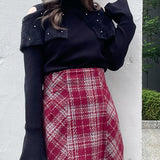 フェザー衿肩開きニット