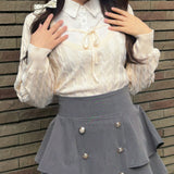 レイヤードケーブルニット