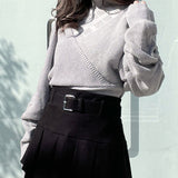 シャーリング袖カシュクールニット