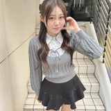 レイヤードケーブルニット