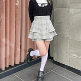 レイヤードケーブルニット