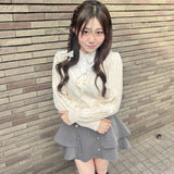 レイヤードケーブルニット